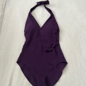 Stunning Gottex one-piece swimsuit in a deep purple.